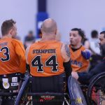 The Texas Stampede huddle up during the 2025 USWRA Division I championship game. (Photo by Christopher Di Virgilio).