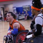 Texas Stampede's Alex Pabon, with ball, voices his concern over a call during the 2025 USWRA Division I championships. (Photo by Christopher Di Virgilio).