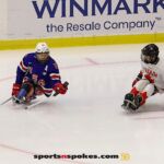 Team USA's Declan Farmer, No 16, attempts to get past Rob Armstrong during the gold medal match at the 2025 World Para Ice Hockey Championships at LECOM Harborcenter in Buffalo. (Photo by Christopher Di Virgilio).