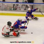 Team USA's Josh Pauls, No 27 and Noah Grove, No 22, team up against Canada's Vincent Boily during the gold medal match at the 2025 World Para Ice Hockey Championships at LECOM Harborcenter in Buffalo. (Photo by Christopher Di Virgilio).