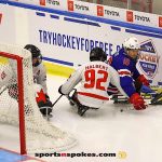 Team Canada's Auren Halbert, No 92, and Team USA's Declan Farmer battle for possession of the puck during the gold medal match at the 2025 World Para Ice Hockey Championships at LECOM Harborcenter in Buffalo. (Photo by Christopher Di Virgilio).