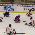 USA's Declan Farmer, center, is surrounded by Team Canada during the gold medal match at the 2025 World Para Ice Hockey Championships at LECOM Harborcenter in Buffalo. (Photo by Christopher Di Virgilio).