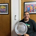 Noah Hotchkiss sits with his 2015 SNS Junior Athlete of the Year Award.(Photo courtesy of Hotchkiss family).