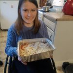 Madelyn Wilson offers up one of her delicious lasagnas for a family in need. (Photo courtesy Wilson family).