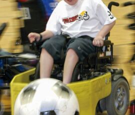 Division II One-on-One winner, Ian Wright, #91 for the Okanaga Thunderchairs at the Power Soccer Tournament in Mesa, AZ,
11/19/05. (Photo by Nancy Crase). Ian Wright